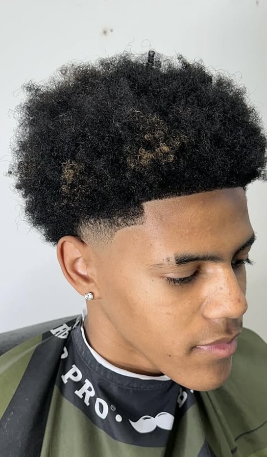 High top afro with temple fade and sharp lineup by Sharp Society Barbershop
